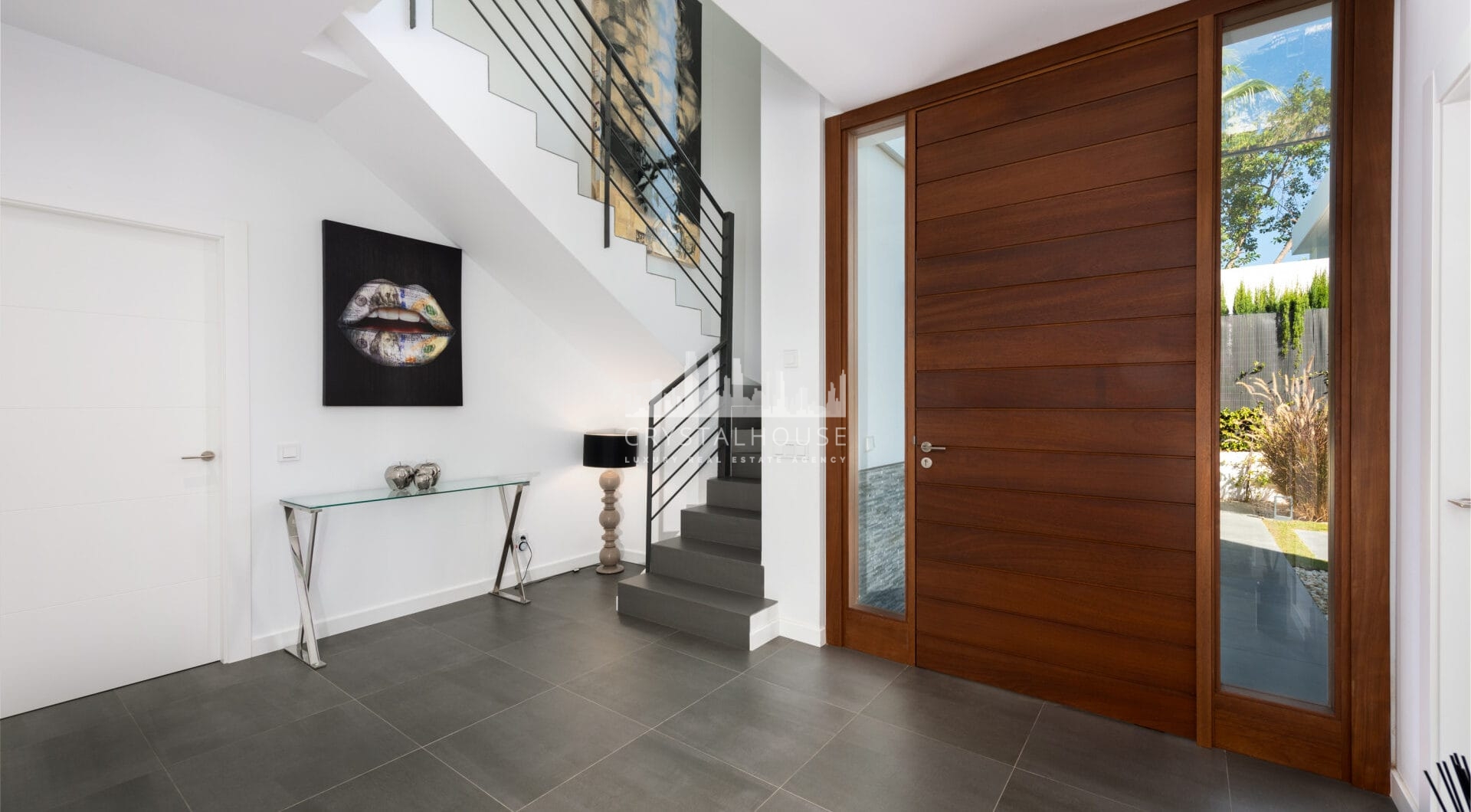 This contemporary four-bedroom detached villa, located in Atalaya Isdabe, is a perfect blend of comfort and luxury