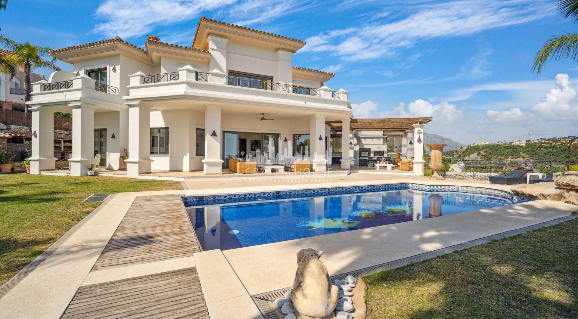 Impressive four-bedroom frontline golf villa in Los Arqueros, Benahavis with sea and mountain views