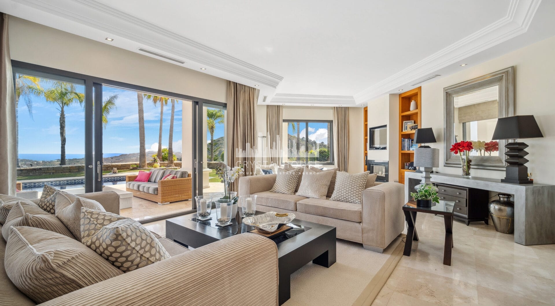 Impressive four-bedroom frontline golf villa in Los Arqueros, Benahavis with sea and mountain views