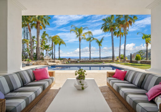 Impressive four-bedroom frontline golf villa in Los Arqueros, Benahavis with sea and mountain views