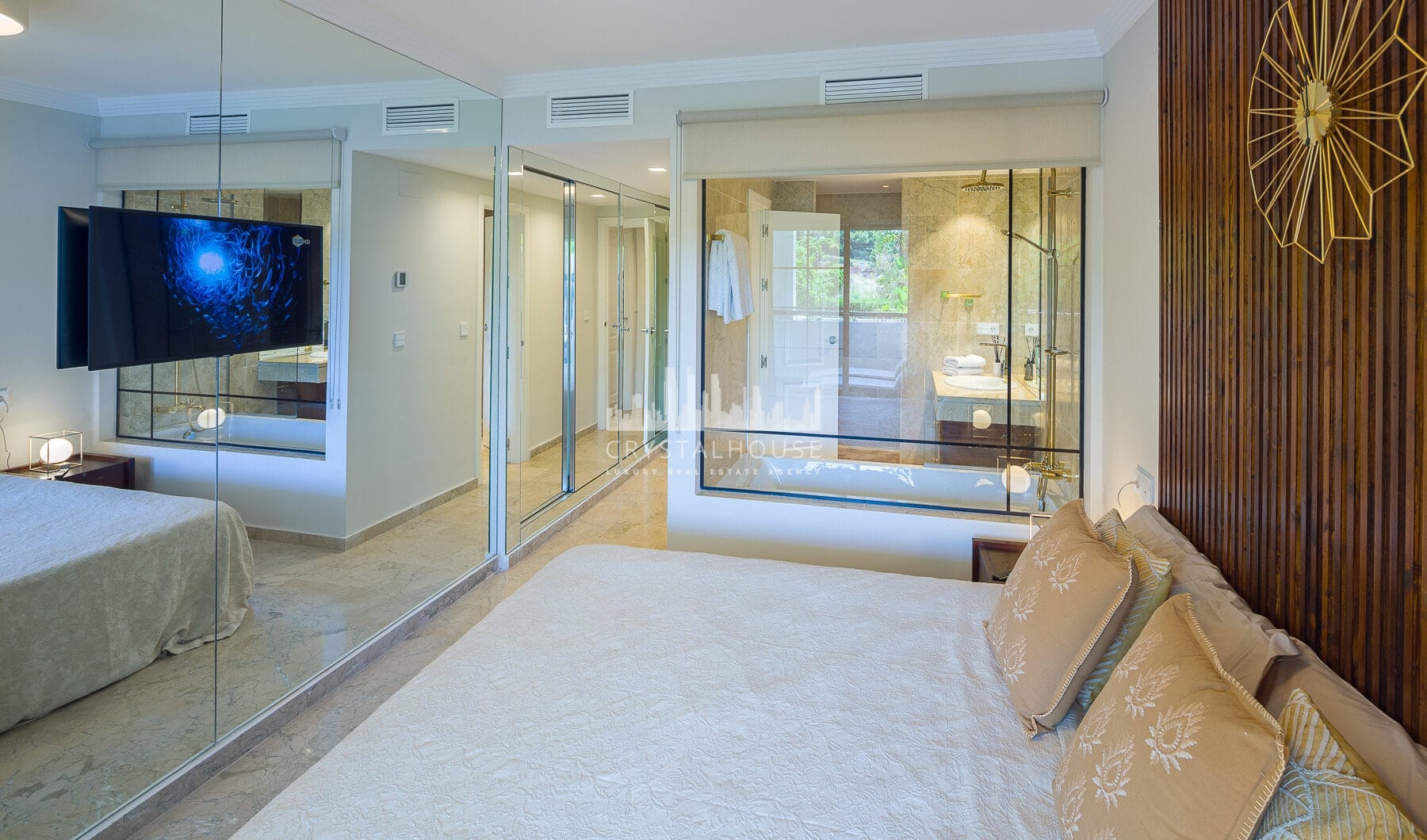 Stunning two bedroom south west facing elevated ground floor apartment in the heart of Marbella's Golden Mile