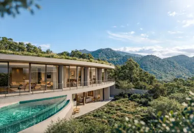 Contemporary curved villa with expansive floor-to-ceiling glass windows and a green roof, set on a mountainside surrounded by lush forest. A semi-circular infinity pool extends from the terrace, overlooking rolling hills and scenic mountain views under a clear blue sky. jak wyżej Title: Modern Coastal Villa – Contemporary Home with Infinity Pool and Panoramic Views Alt text: Modern curved villa with large floor-to-ceiling glass windows and a green roof, set on a hillside overlooking the ocean and rolling mountains. A sleek infinity pool wraps around the terrace, furnished with sun loungers and outdoor seating, surrounded by lush greenery under a clear blue sky. yak wyżej Title: Modern Hillside Villa – Luxury Retreat with Panoramic Mountain and Sea Views Alt text: Contemporary curved villa with a green roof and expansive glass walls, nestled on a lush mountainside. The home overlooks rolling green hills, a winding road, and distant ocean views under a clear blue sky, creating a secluded luxury retreat in nature. Dodaj frazę kluczową lub synonimy do tagów alt odpowiednich obrazów! Oczywiście 🙂 Poniżej alt tagi wzbogacone o frazy kluczowe i ich naturalne synonimy (np. modern villa, luxury villa, contemporary house, infinity pool, hillside home, coastal residence), dopasowane do każdego obrazu. 1️⃣ Obraz 1 – willa na wzgórzu z basenem panoramicznym Alt text: Modern villa with infinity pool – luxury contemporary house with floor-to-ceiling glass walls and green roof, located on a hillside surrounded by trees. Curved panoramic pool and spacious terrace with sun loungers overlooking natural landscape. 2️⃣ Obraz 2 – willa z widokiem na ocean Alt text: Modern cliffside villa with infinity pool – luxury coastal residence featuring curved architecture, glass façade and green roof. Contemporary hillside home overlooking the ocean with panoramic sea views and terrace lounge area. 3️⃣ Obraz 3 – willa wśród gór i lasu Alt text: Contemporary hillside villa with infinity pool – modern luxury house with curved design and full-height glass windows. Spacious terrace and outdoor lounge overlooking forested mountains and scenic natural landscape. 4️⃣ Obraz 4 – willa górska z półkolistym basenem Alt text: Modern mountain villa with infinity pool – luxury contemporary residence with panoramic glazing and green roof. Curved architectural design set on a mountainside with expansive forest and valley views. 5️⃣ Obraz 5 – willa z widokiem na góry i morze Alt text: Luxury modern villa with infinity pool – contemporary coastal home with curved terrace and glass walls. Hillside residence overlooking mountains and ocean, surrounded by lush greenery and natural scenery. 6️⃣ Obraz 6 – panorama z lotu ptaka Alt text: Modern hillside villa with panoramic views – luxury contemporary house with infinity pool and green roof, nestled in mountain landscape. Coastal retreat overlooking winding road, rolling hills and distant sea horizon. Jeśli chcesz, mogę też: zoptymalizować je bardziej pod SEO (np. pod konkretną frazę główną), skrócić je do idealnej długości pod WCAG (125 znaków), przygotować wersję pod marketplace (np. stock, real estate, archviz). napisz Title: Modern Cliffside Villa – Luxury Coastal Residence with Infinity Pool Alt text: Modern cliffside villa with infinity pool – luxury contemporary coastal home featuring curved architecture, floor-to-ceiling glass walls and green roof. Hillside residence overlooking the ocean and rolling mountains with panoramic sea views and terrace lounge area.