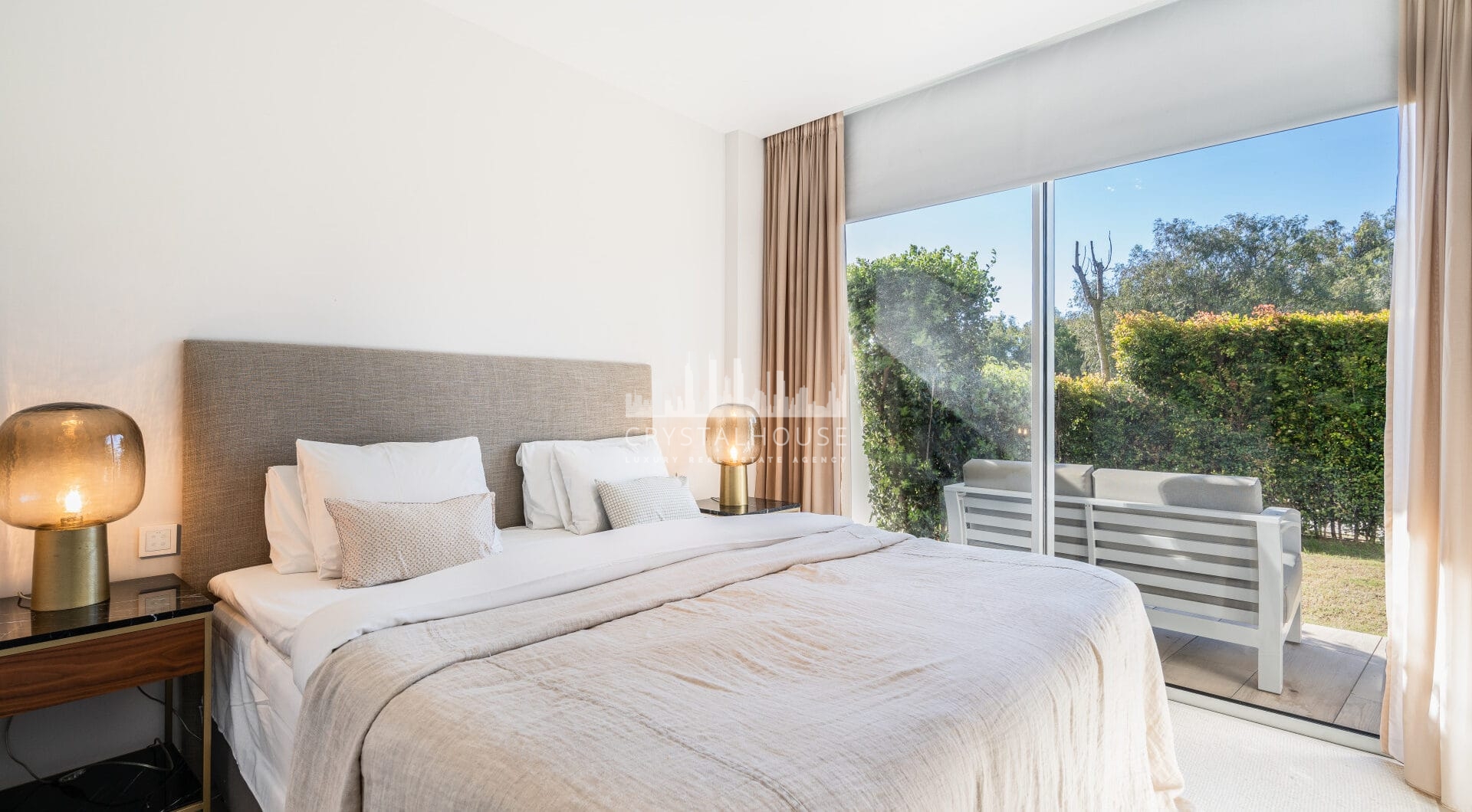 Luxurious beachfront apartment with private garden