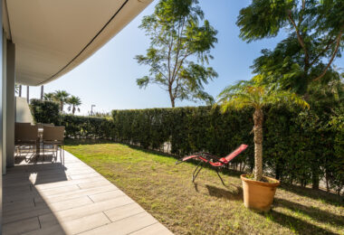 Luxurious beachfront apartment with private garden