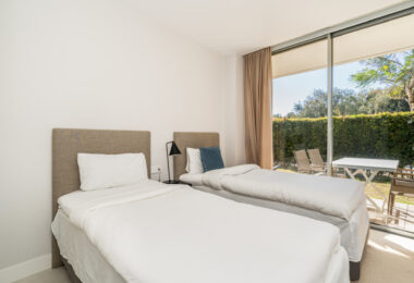 Luxurious beachfront apartment with private garden