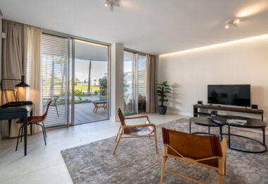 Luxurious beachfront apartment with private garden
