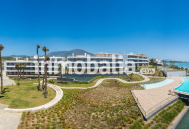 Luxurious beachfront apartment with private garden