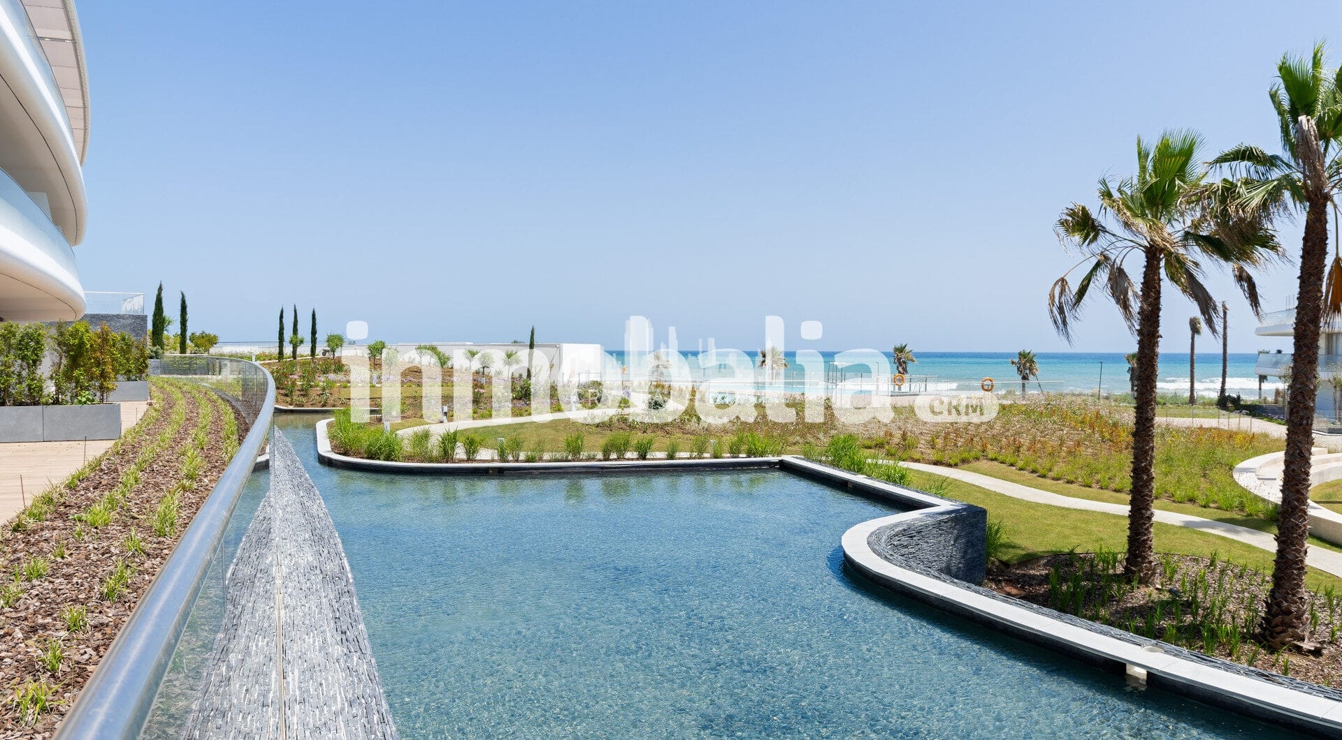 Luxurious beachfront apartment with private garden