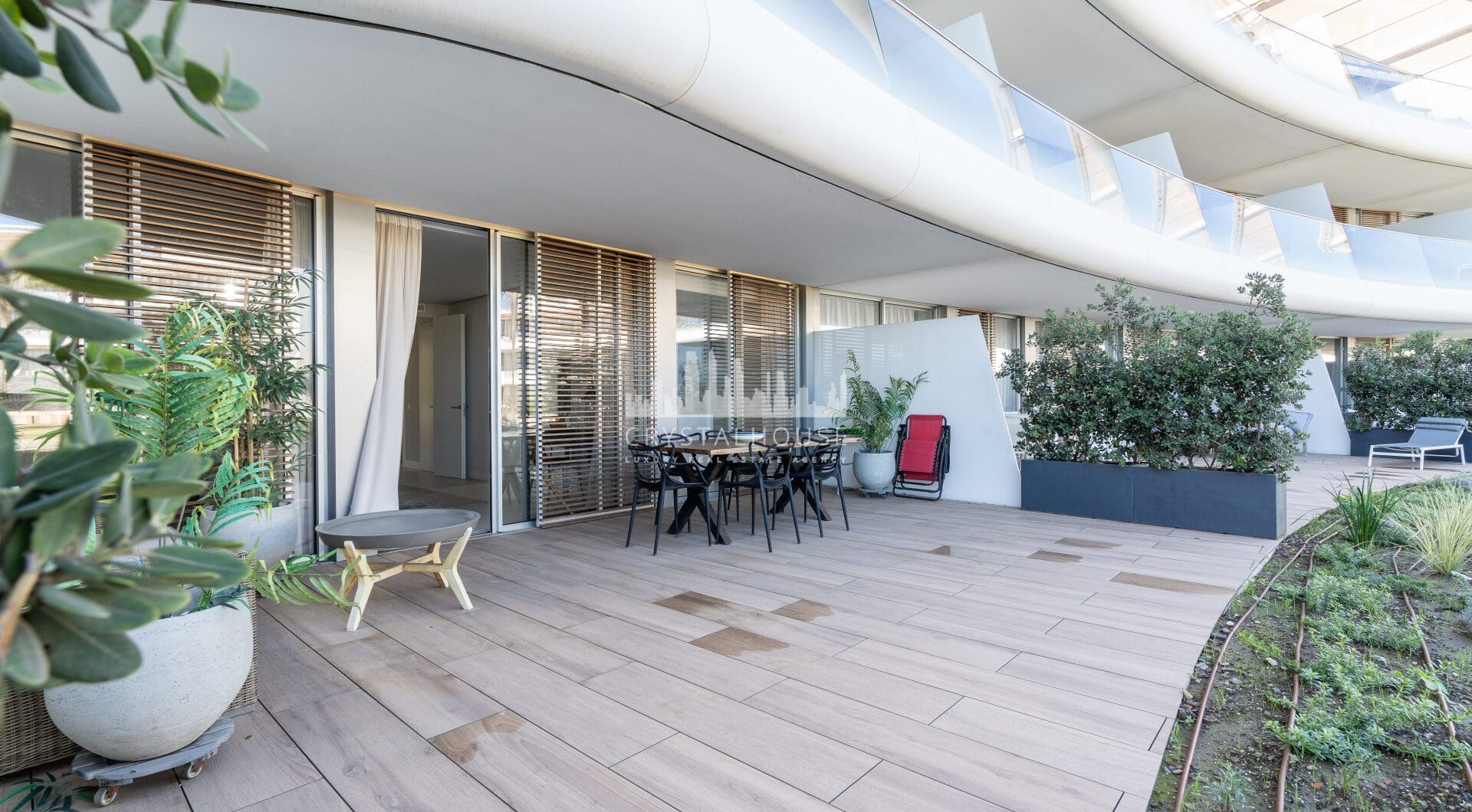 Luxurious beachfront apartment with private garden