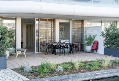 Luxurious beachfront apartment with private garden