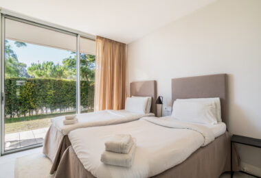 Luxurious beachfront apartment with private garden