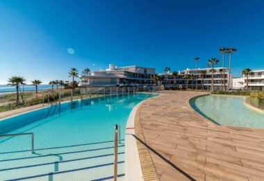 Luxurious beachfront apartment with private garden