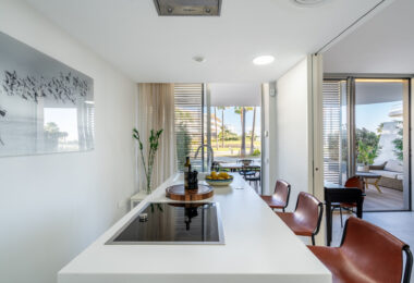 Luxurious beachfront apartment with private garden