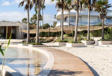 Luxurious beachfront apartment with private garden