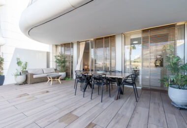 Luxurious beachfront apartment with private garden
