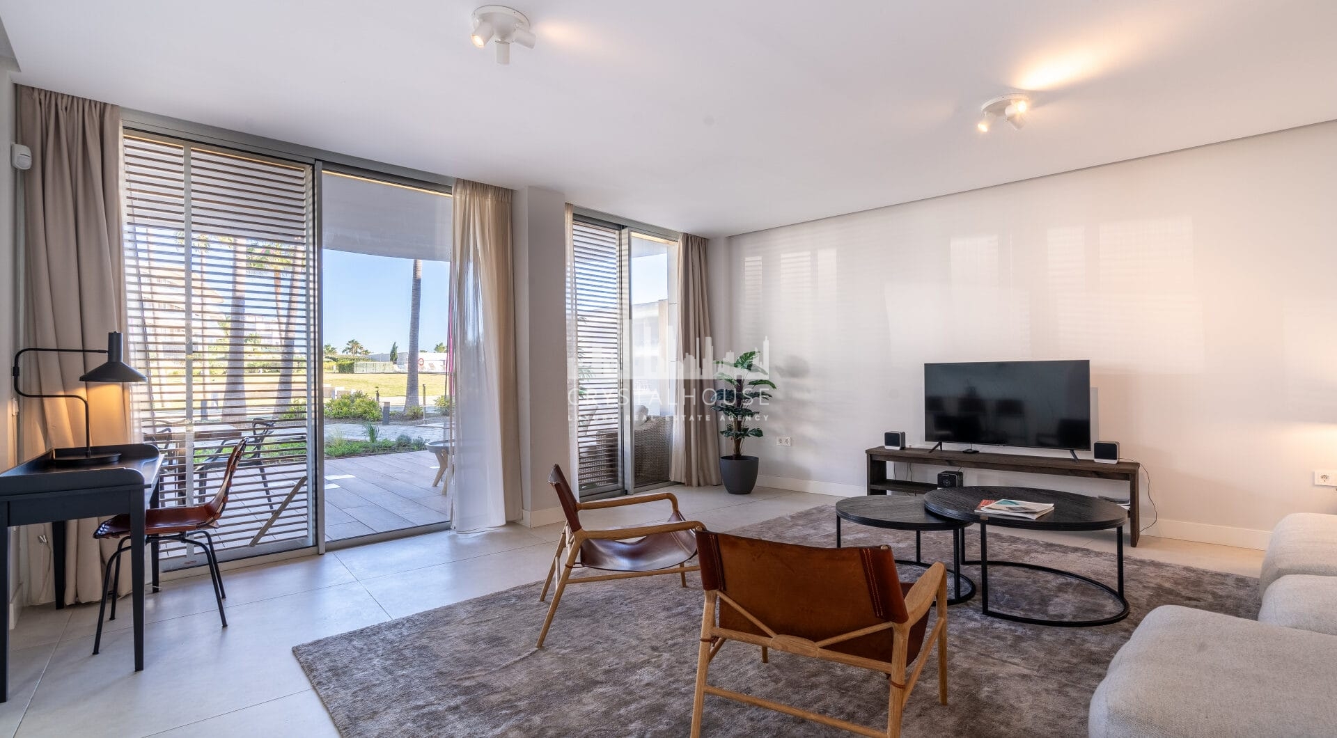 Luxurious beachfront apartment with private garden