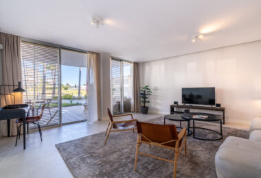 Luxurious beachfront apartment with private garden
