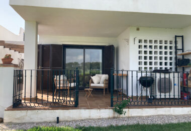 Frontline golf ground-floor apartment with stunning views in La Alcaidesa, near Sotogrande, Cadiz