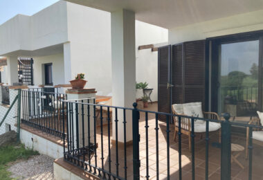 Frontline golf ground-floor apartment with stunning views in La Alcaidesa, near Sotogrande, Cadiz