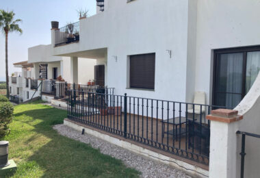 Frontline golf ground-floor apartment with stunning views in La Alcaidesa, near Sotogrande, Cadiz