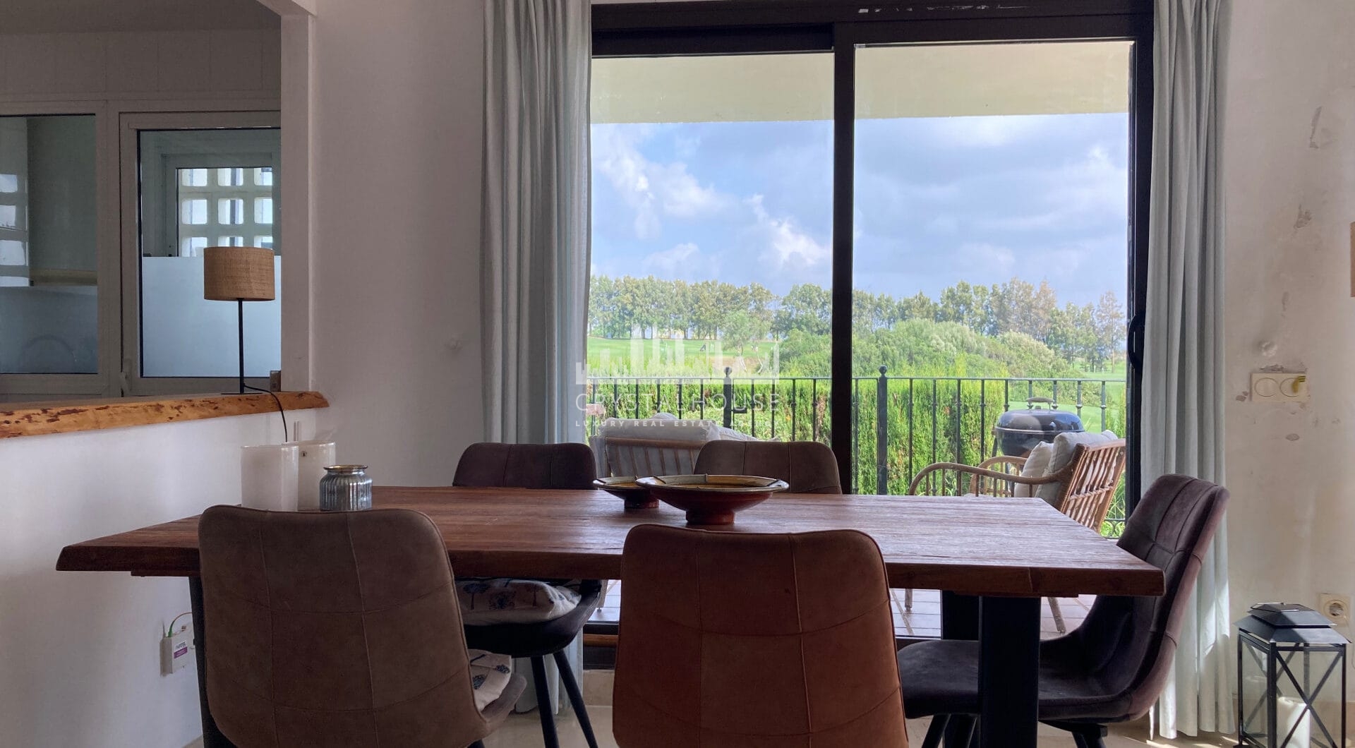 Frontline golf ground-floor apartment with stunning views in La Alcaidesa, near Sotogrande, Cadiz