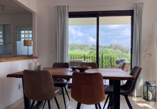Frontline golf ground-floor apartment with stunning views in La Alcaidesa, near Sotogrande, Cadiz
