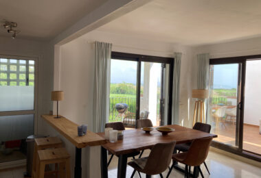 Frontline golf ground-floor apartment with stunning views in La Alcaidesa, near Sotogrande, Cadiz