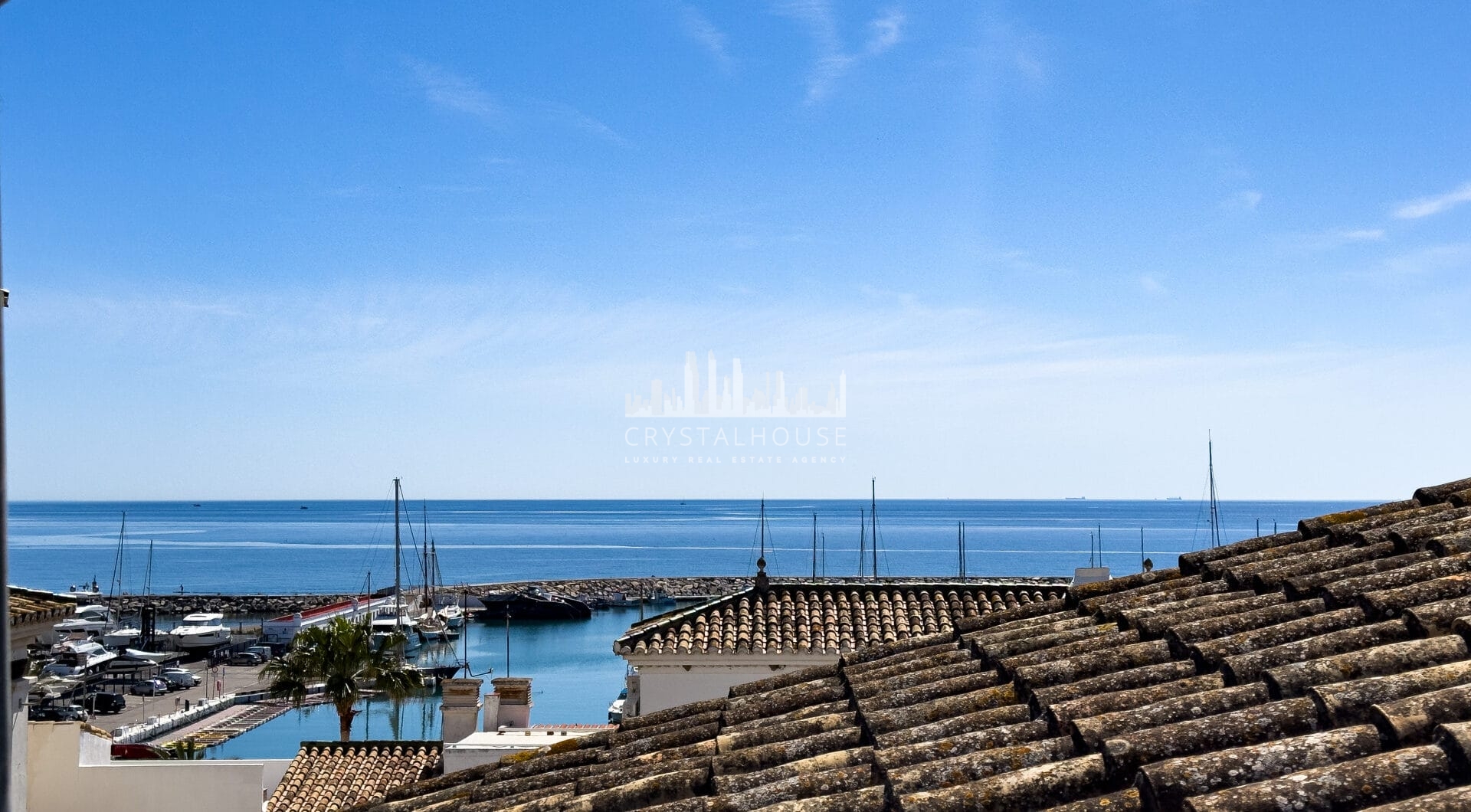 Duplex Penthouse in Puerto de la Duquesa with Partial Sea and Marina Views.
