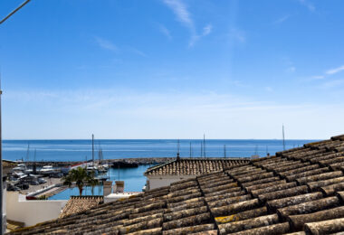 Duplex Penthouse in Puerto de la Duquesa with Partial Sea and Marina Views.