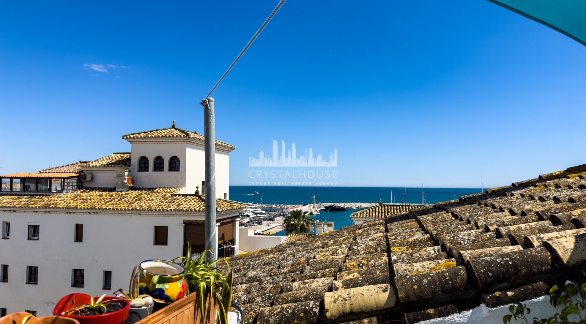Duplex Penthouse in Puerto de la Duquesa with Partial Sea and Marina Views.