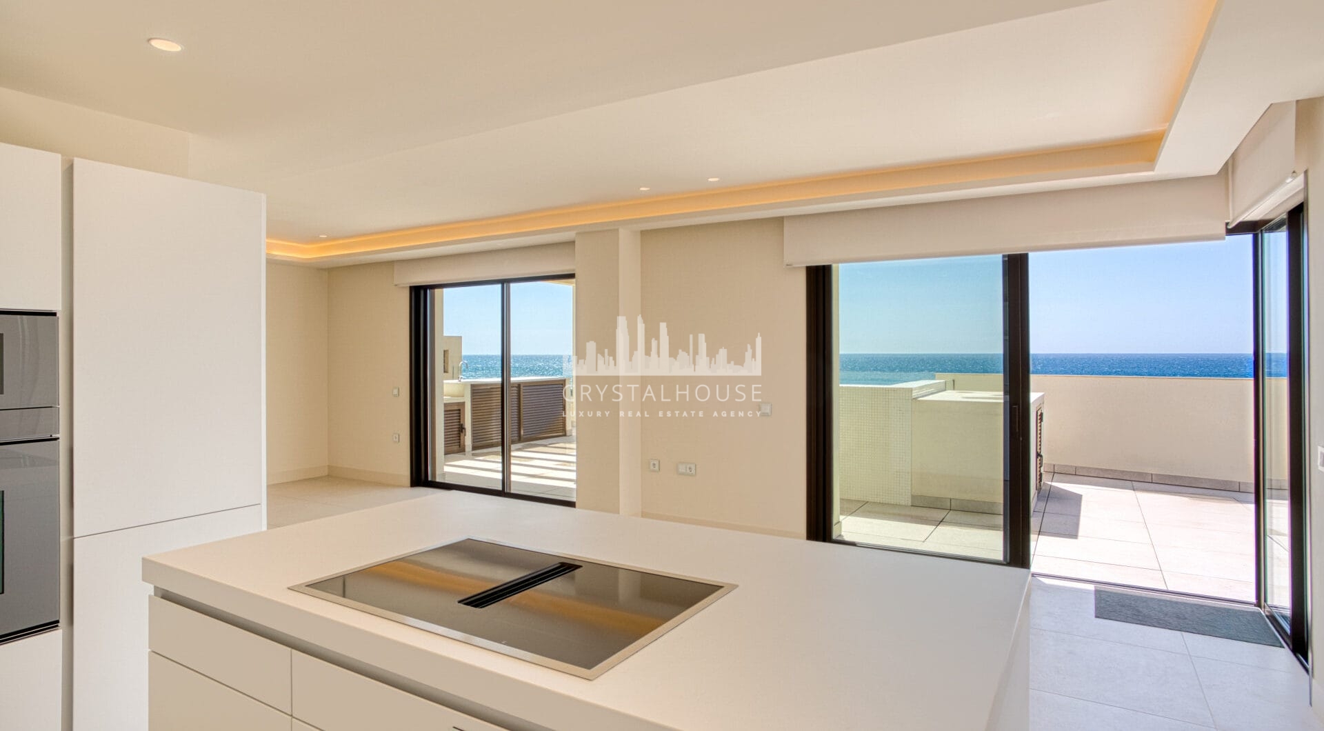 Luxurious four-bedroom duplex penthouse located in a beachfront community on Marbella’s prestigious New Golden Mile with sea views