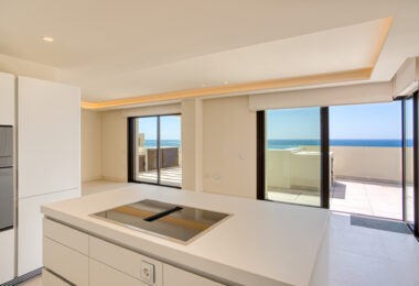 Luxurious four-bedroom duplex penthouse located in a beachfront community on Marbella’s prestigious New Golden Mile with sea views