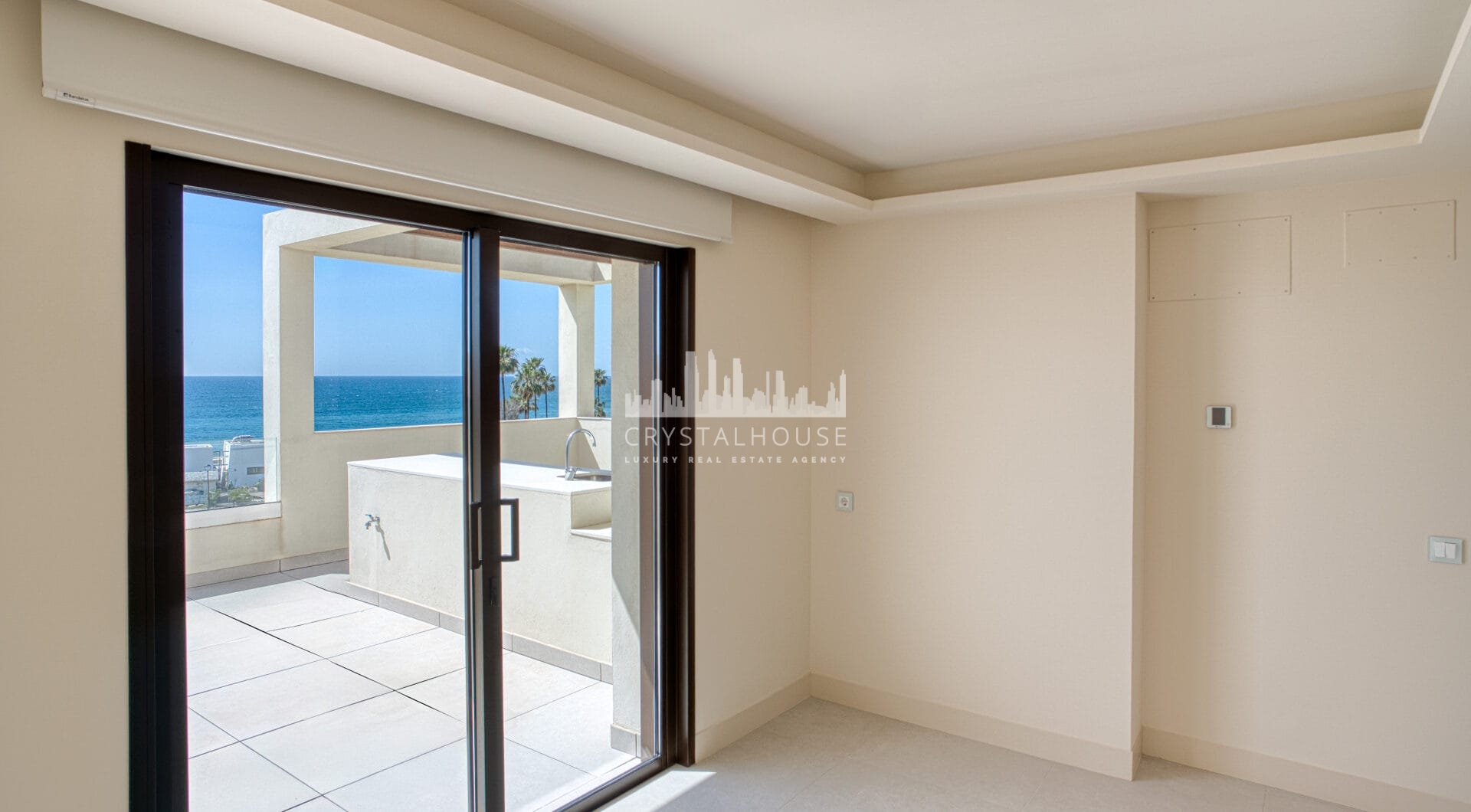 Luxurious four-bedroom duplex penthouse located in a beachfront community on Marbella’s prestigious New Golden Mile with sea views