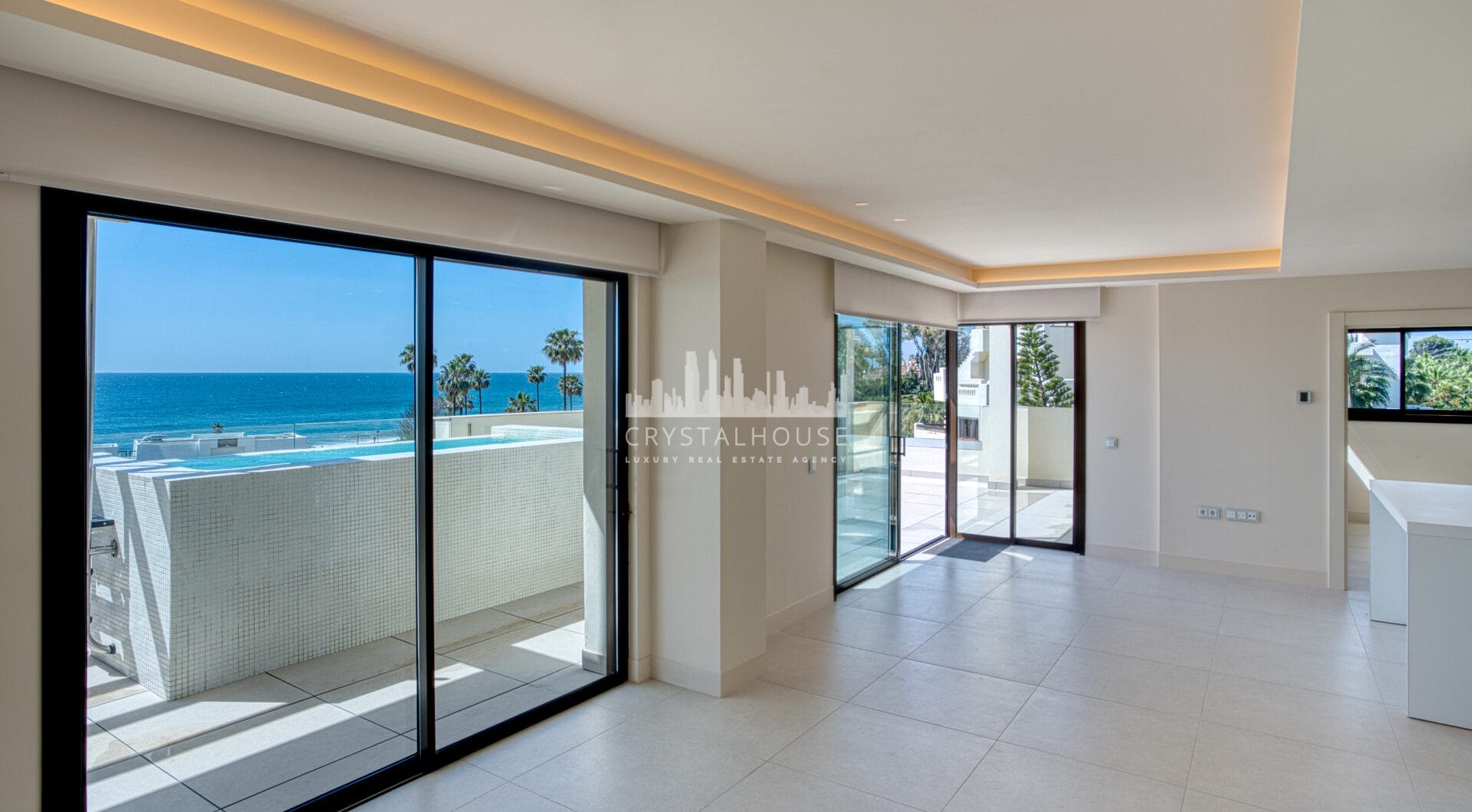 Luxurious four-bedroom duplex penthouse located in a beachfront community on Marbella’s prestigious New Golden Mile with sea views