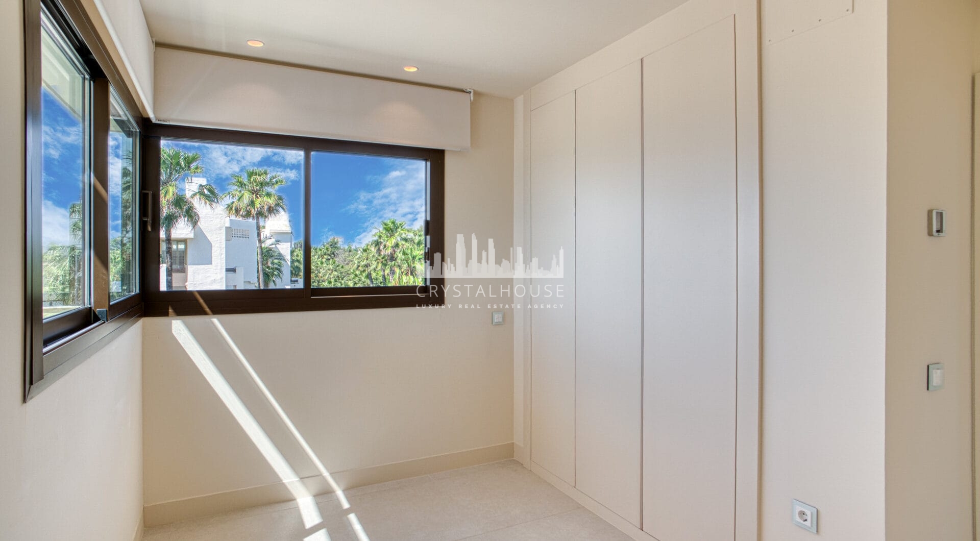 Luxurious four-bedroom duplex penthouse located in a beachfront community on Marbella’s prestigious New Golden Mile with sea views