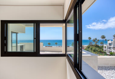 Luxurious four-bedroom duplex penthouse located in a beachfront community on Marbella’s prestigious New Golden Mile with sea views