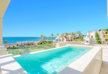 Luxurious four-bedroom duplex penthouse located in a beachfront community on Marbella’s prestigious New Golden Mile with sea views