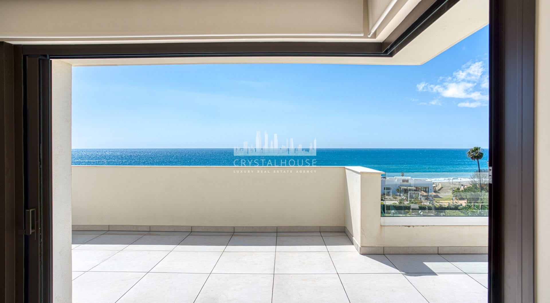Luxurious four-bedroom duplex penthouse located in a beachfront community on Marbella’s prestigious New Golden Mile with sea views