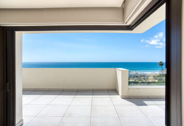Luxurious four-bedroom duplex penthouse located in a beachfront community on Marbella’s prestigious New Golden Mile with sea views