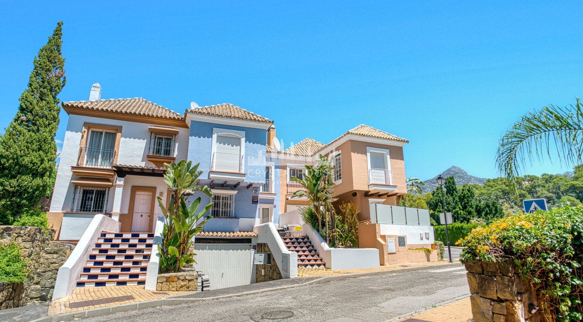 Elegant two bedroom, south west facing townhouse set within an exclusive gated community of Nueva Andalucia, Marbella
