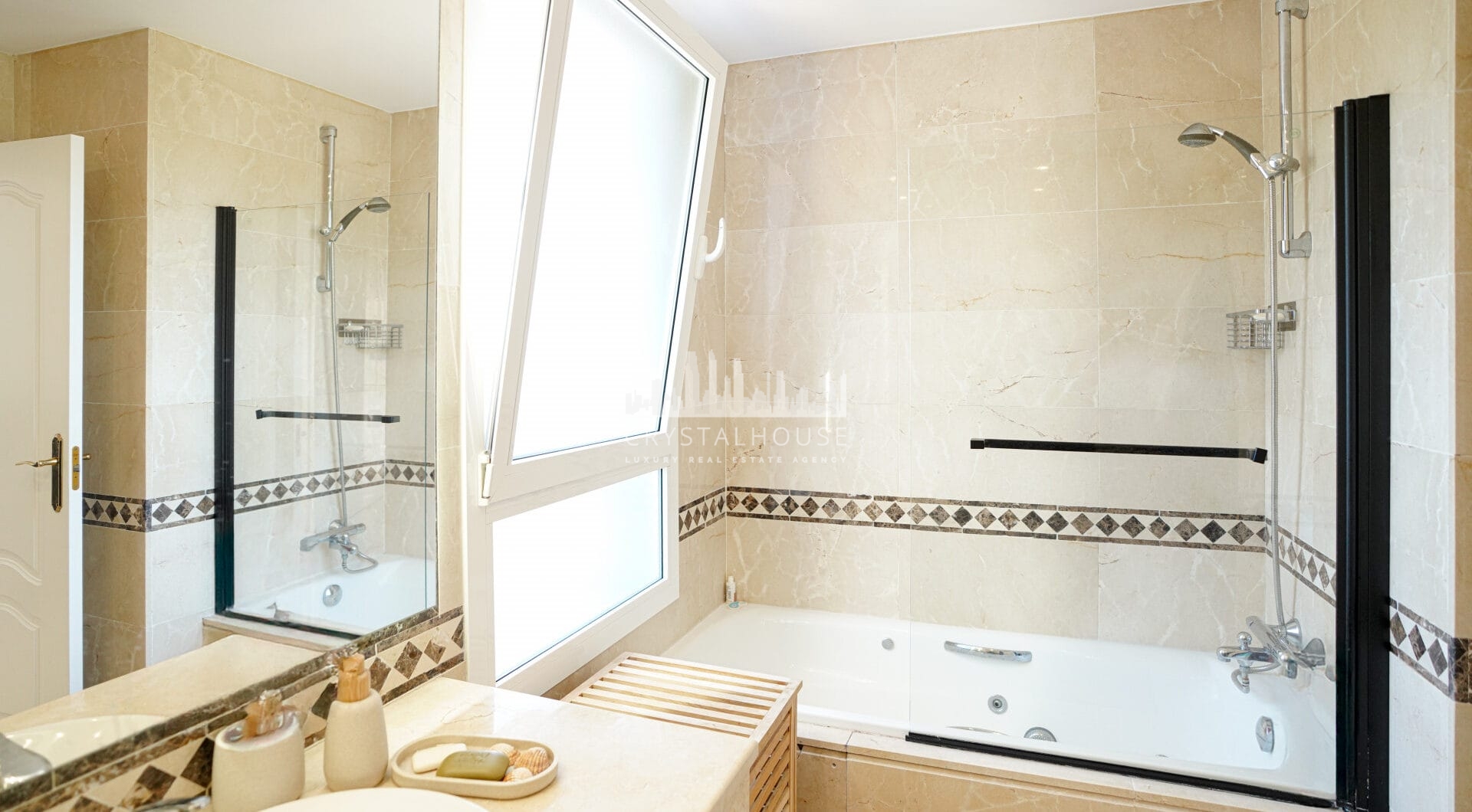 Elegant two bedroom, south west facing townhouse set within an exclusive gated community of Nueva Andalucia, Marbella