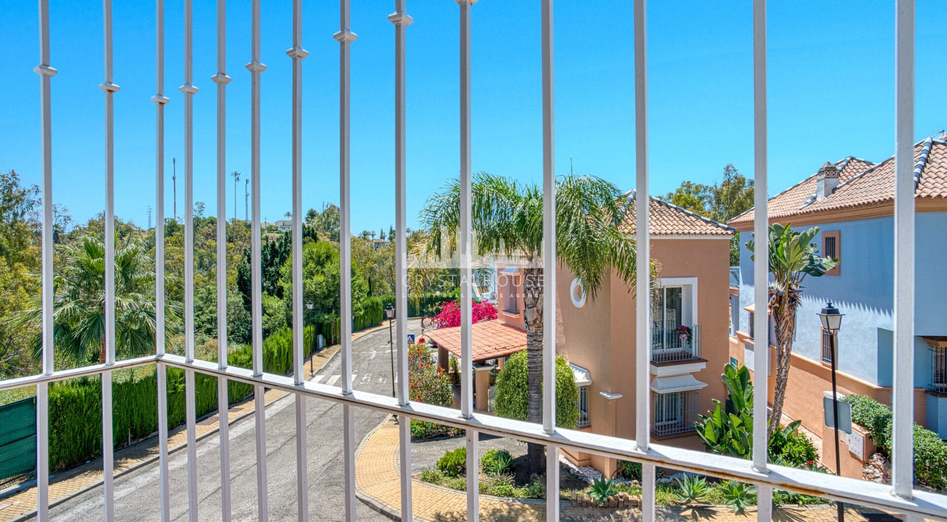 Elegant two bedroom, south west facing townhouse set within an exclusive gated community of Nueva Andalucia, Marbella