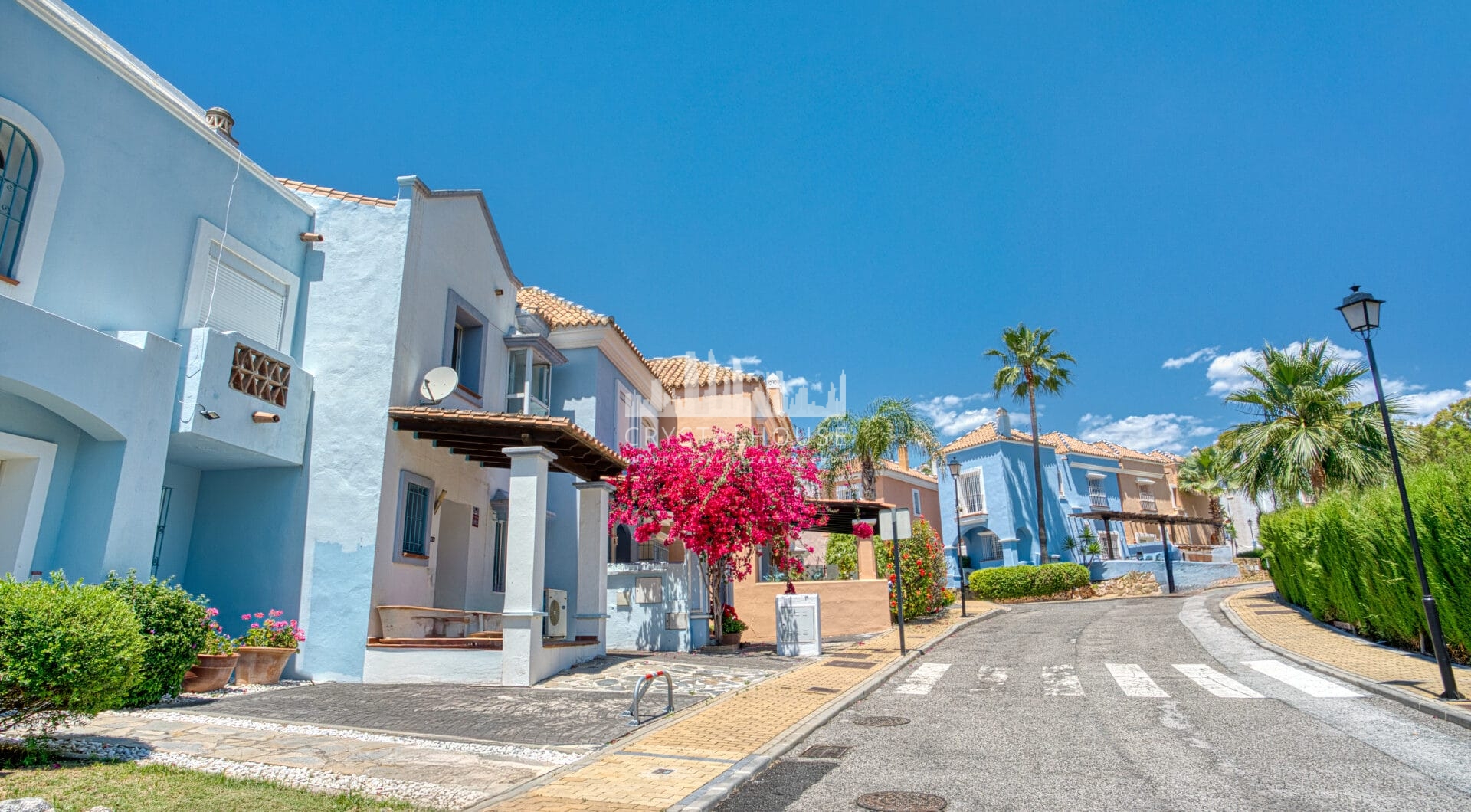 Elegant two bedroom, south west facing townhouse set within an exclusive gated community of Nueva Andalucia, Marbella
