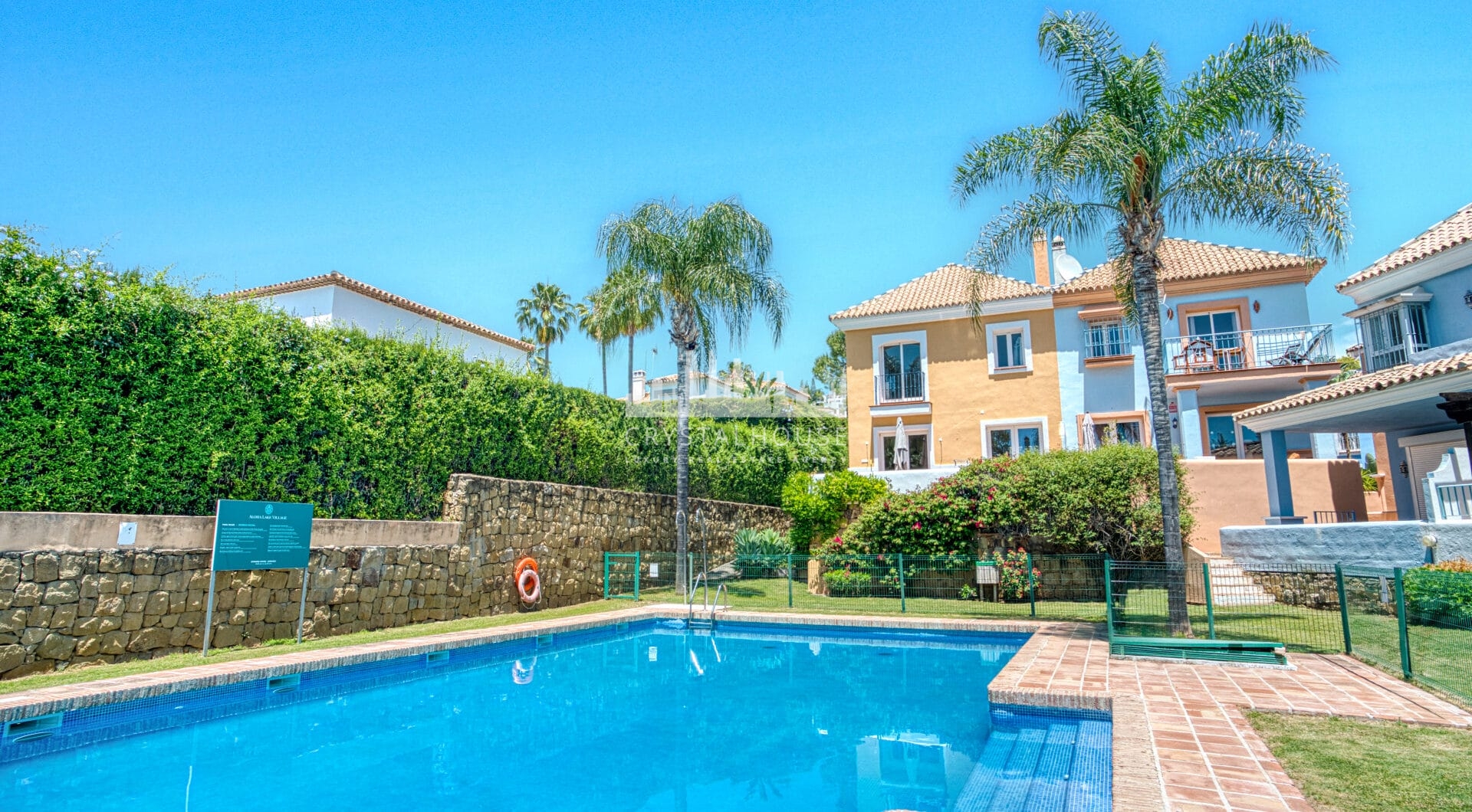 Elegant two bedroom, south west facing townhouse set within an exclusive gated community of Nueva Andalucia, Marbella