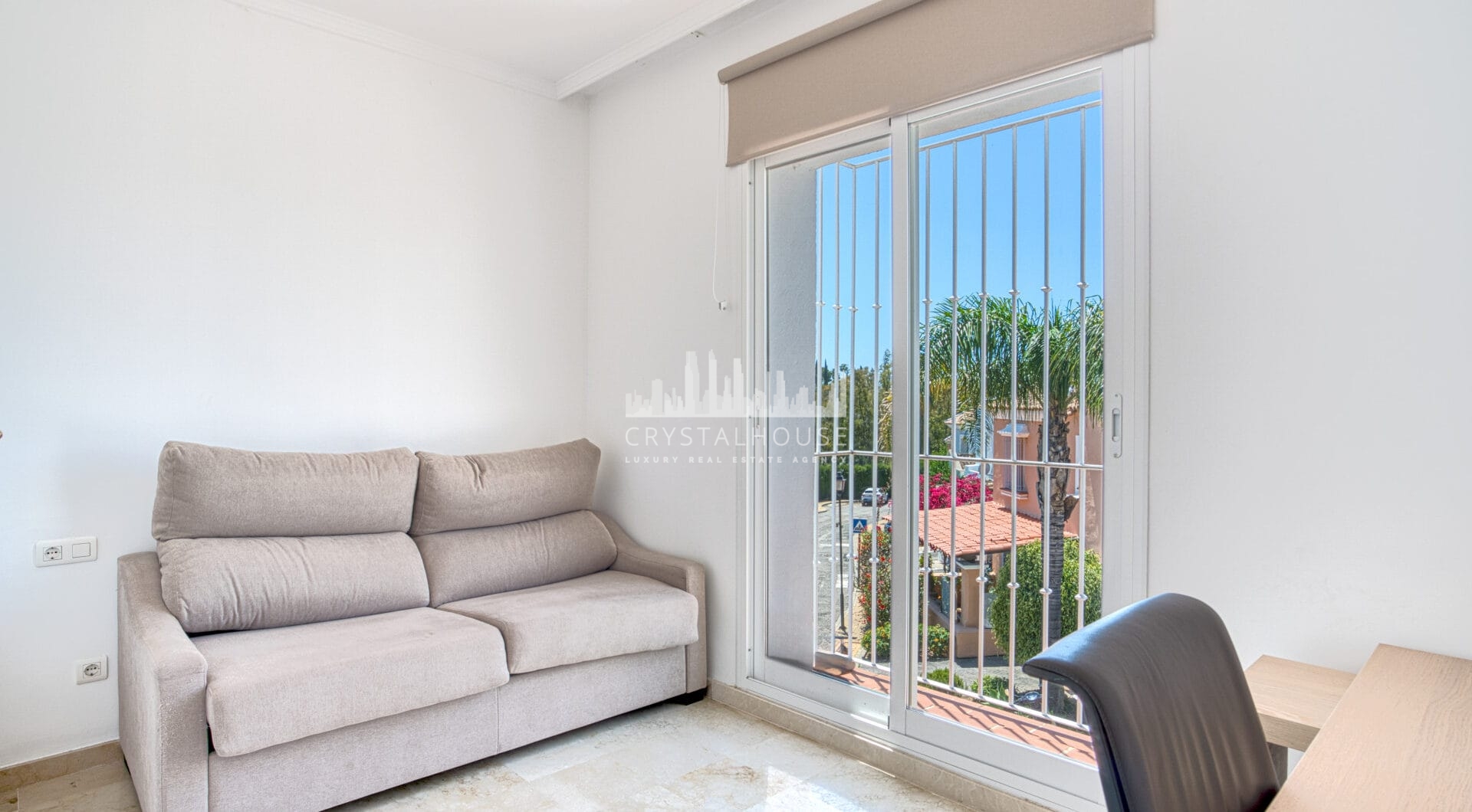 Elegant two bedroom, south west facing townhouse set within an exclusive gated community of Nueva Andalucia, Marbella