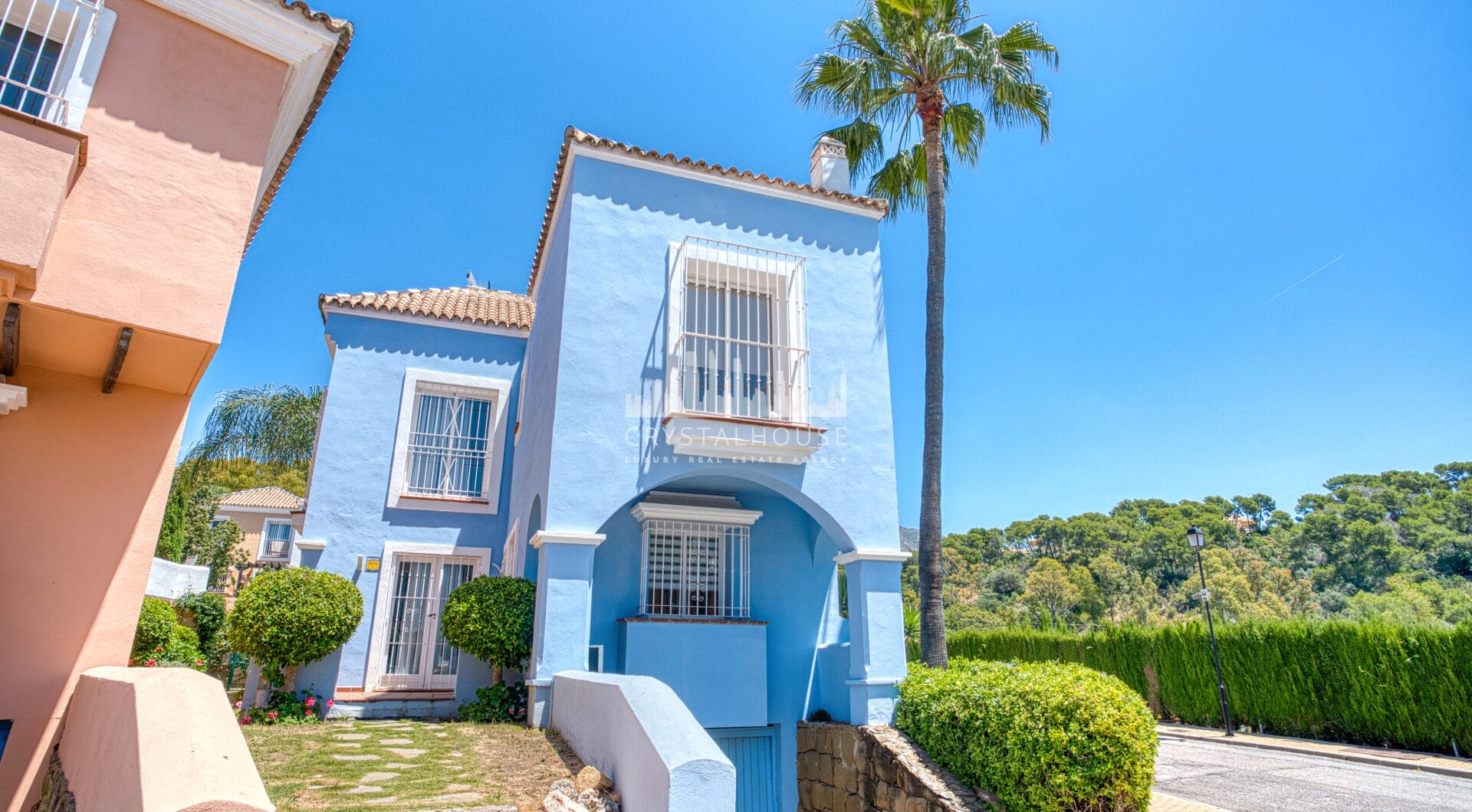 Elegant two bedroom, south west facing townhouse set within an exclusive gated community of Nueva Andalucia, Marbella