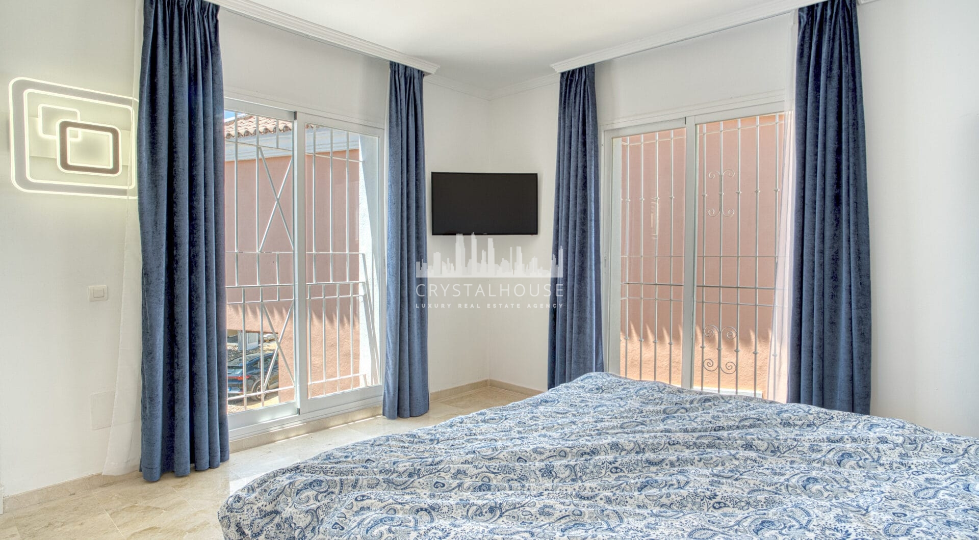 Elegant two bedroom, south west facing townhouse set within an exclusive gated community of Nueva Andalucia, Marbella