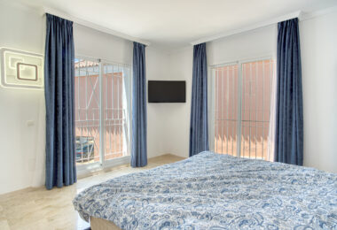 Elegant two bedroom, south west facing townhouse set within an exclusive gated community of Nueva Andalucia, Marbella