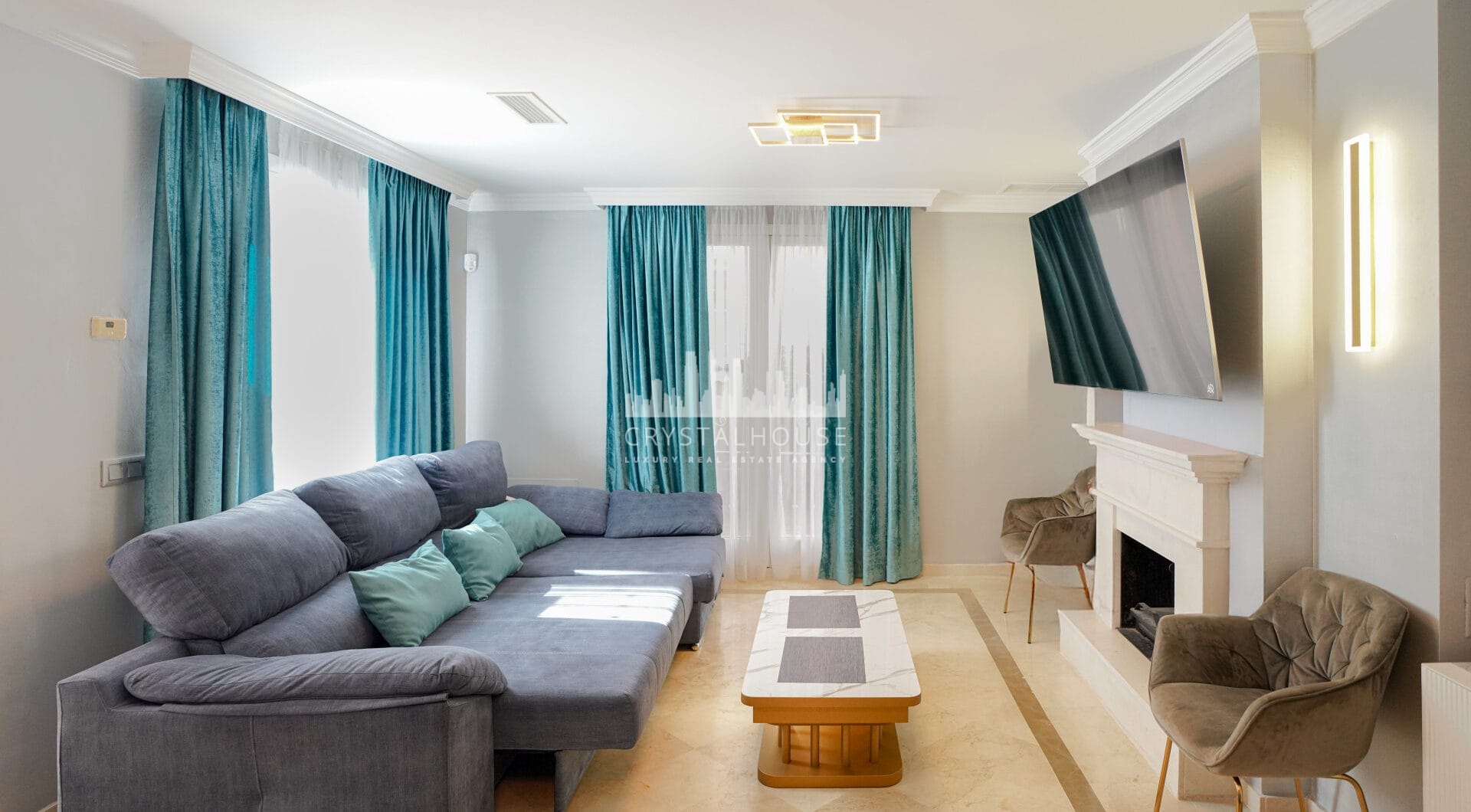 Elegant two bedroom, south west facing townhouse set within an exclusive gated community of Nueva Andalucia, Marbella