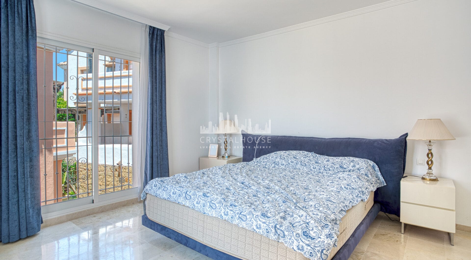 Elegant two bedroom, south west facing townhouse set within an exclusive gated community of Nueva Andalucia, Marbella